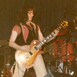 Paul Kossoff with uncovered PAF pickups photo.